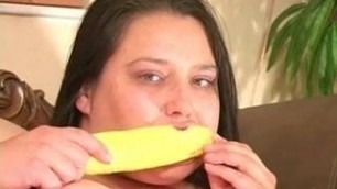 BBW masturbates with a corn